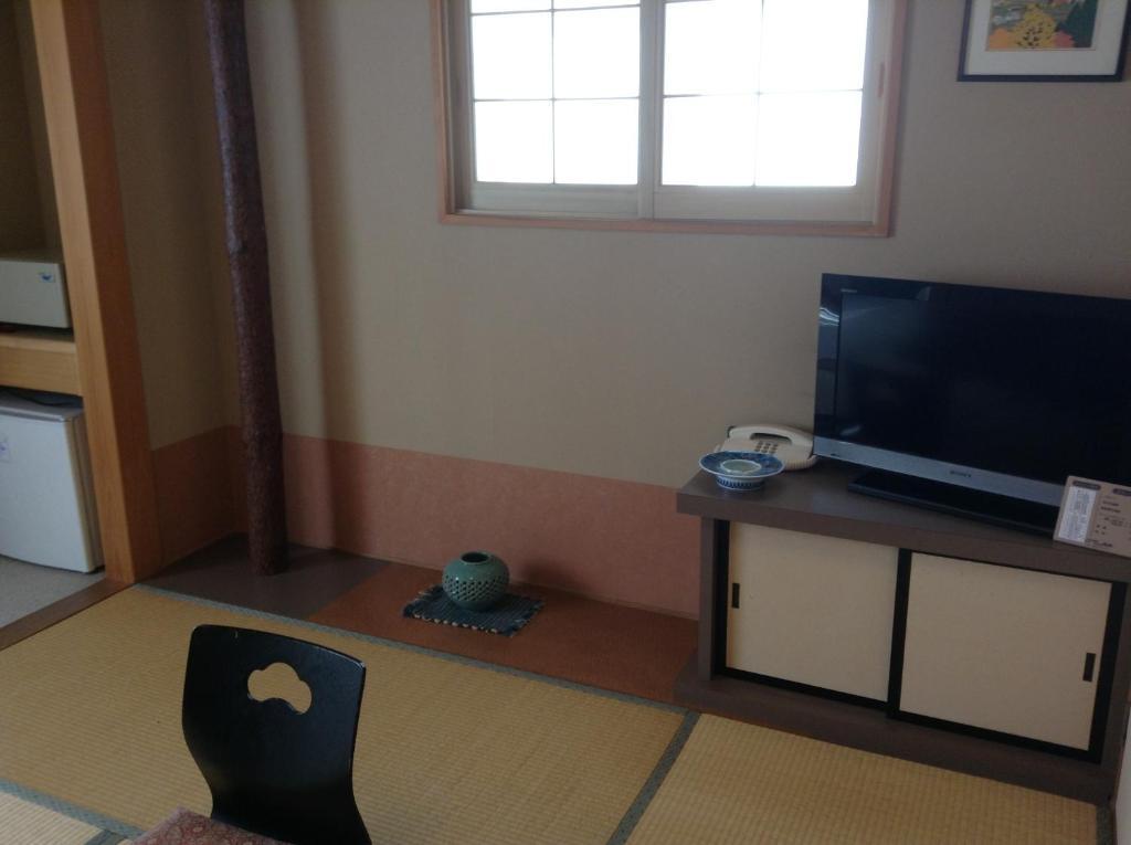 Hotel Bergtour Marukita Hakuba Esterno foto